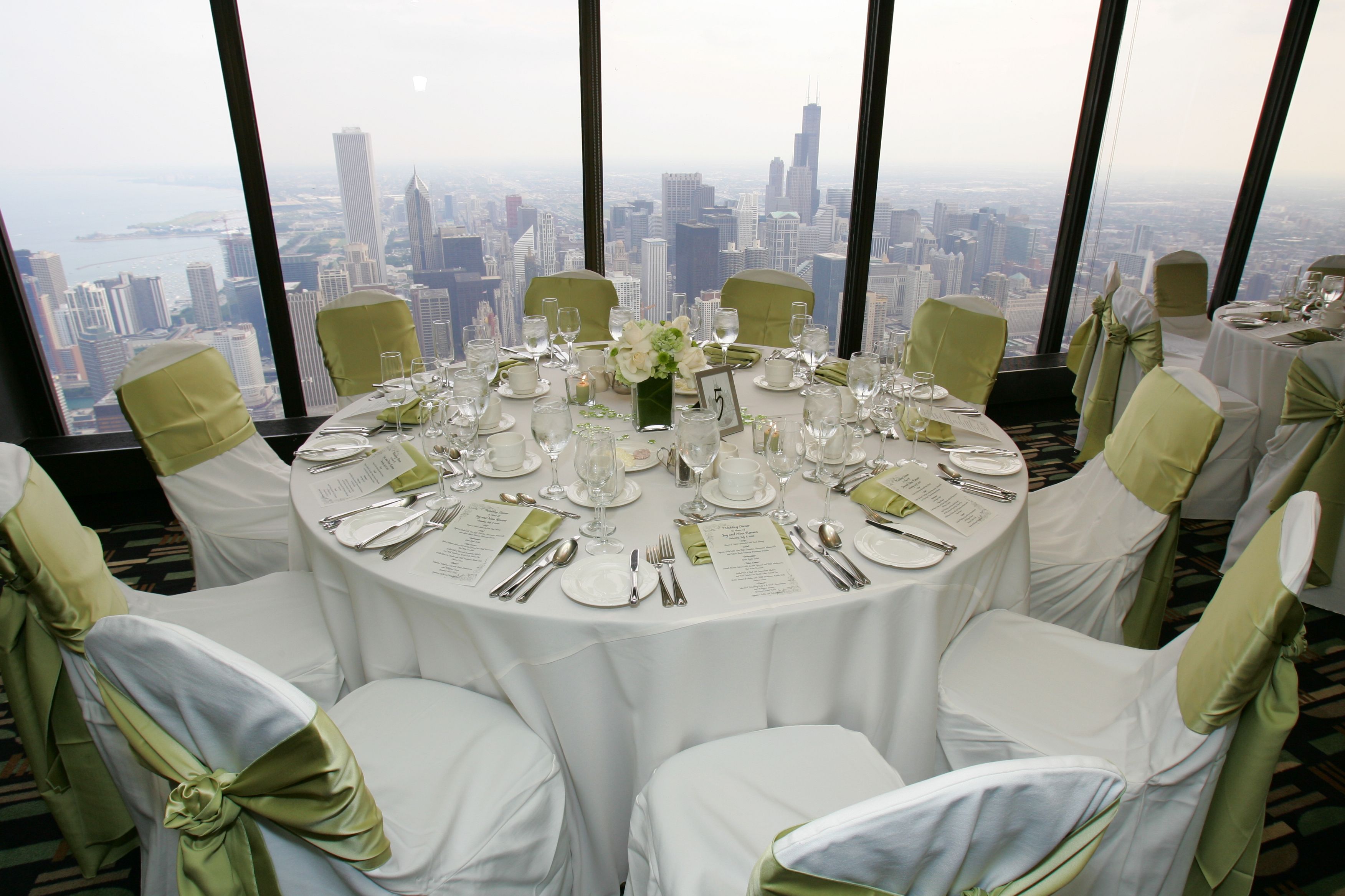 A private table set above the skyline